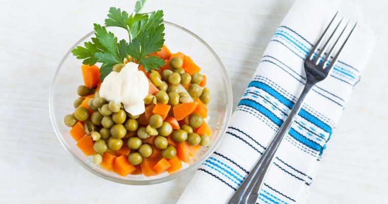 Vegetarian salad with canned peas, boiled carrots